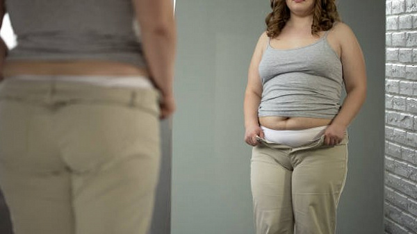 7 причин появления жира на животе и способы убрать его